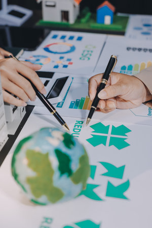 Carbon offset price report CO2 emission. Future growth Net zero waste in ESG ethical SME office protect climate change global warming social issues project. Group of asia people Eco friendly SDGs planの写真素材