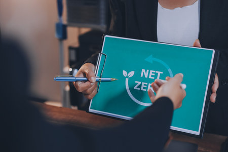 Carbon offset price report CO2 emission. Future growth Net zero waste in ESG ethical SME office protect climate change global warming social issues project. Group of asia people Eco friendly SDGs planの写真素材