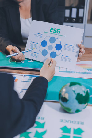 Carbon offset price report CO2 emission. Future growth Net zero waste in ESG ethical SME office protect climate change global warming social issues project. Group of asia people Eco friendly SDGs planの写真素材