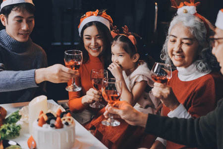 Happy multigeneration family enjoying in opening gifts on Christmas eve at home.の写真素材