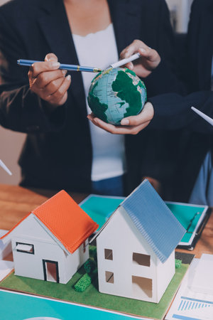 Carbon offset price report CO2 emission. Future growth Net zero waste in ESG ethical SME office protect climate change global warming social issues project. Group of asia people Eco friendly SDGs planの写真素材