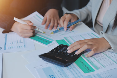 Team of business people are meeting to analyze data for marketing plan,Market research reports and income statistics, Financial and Accounting concept.の写真素材