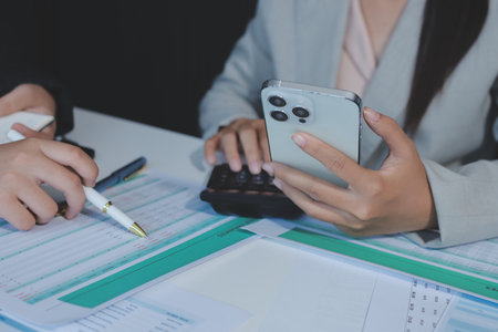 Team of business people are meeting to analyze data for marketing plan,Market research reports and income statistics, Financial and Accounting concept.の写真素材