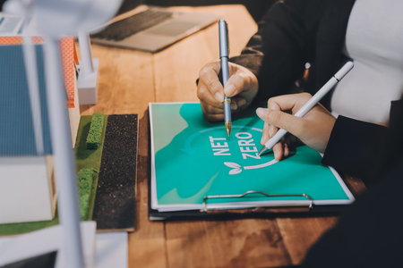 Carbon offset price report CO2 emission. Future growth Net zero waste in ESG ethical SME office protect climate change global warming social issues project. Group of asia people Eco friendly SDGs planの写真素材