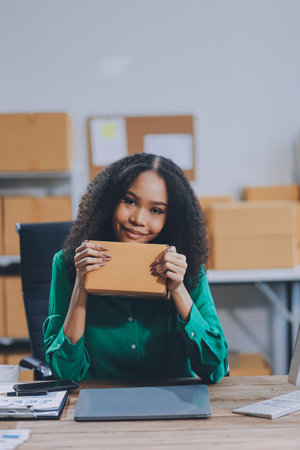 Portrait of Starting small businesses SME owners female entrepreneurs working on receipt box and...