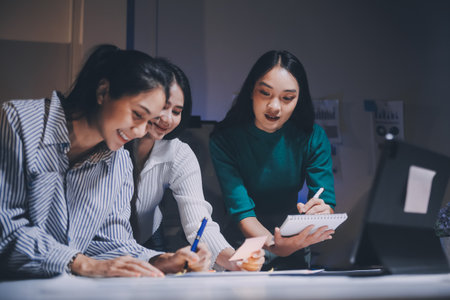 Group of young asian creative business brain storm meeting presentation,discussing roadmap to product launch, planning,strategy,new business development,working with new startup project in office.の写真素材