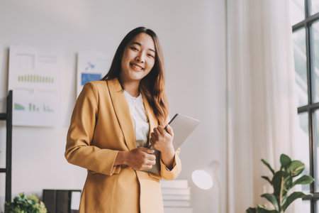 Portrait of confident asian business women in the officeの写真素材