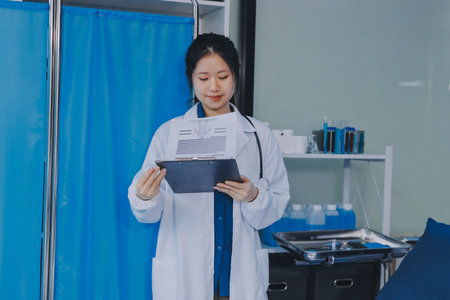 Positive doctor working in medical office, portrait.