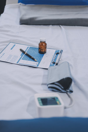 stethoscope on a report stethoscope on a clipboard stethoscope on a bookの写真素材