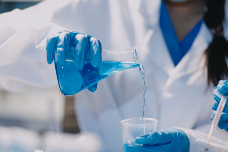 Microbiological research with a test tube and micropipette in close -upの写真素材