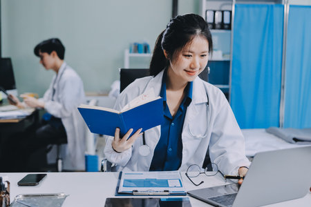 Shot of a group of nurses and doctors having a meeting together.の写真素材
