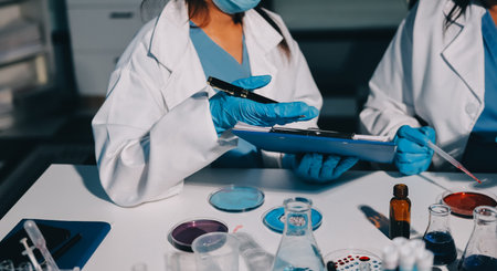 Researchers working in the clinical laboratoryの写真素材
