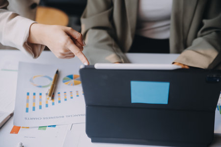 Group of Asian business people team meeting in modern office working design planning and ideas conceptの写真素材