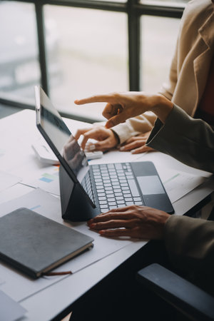 Group of Asian business people team meeting in modern office working design planning and ideas conceptの写真素材