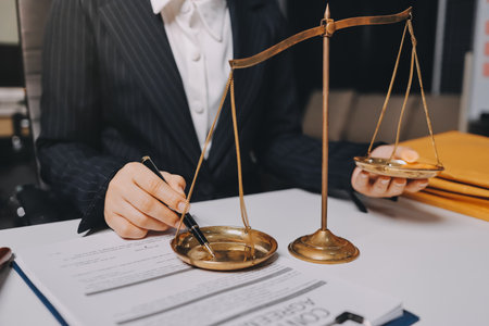 Judge gavel with Justice lawyers having team meeting at law firm background. Concepts of Law and...