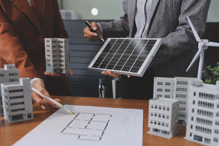 Discussion among businesspeople on the latest developments in solar cell panel technology and Solar...