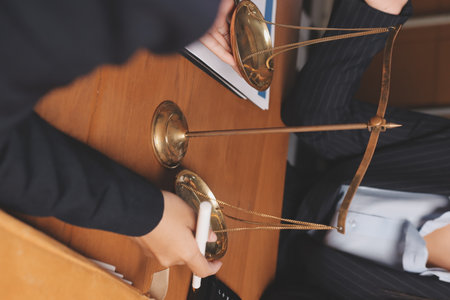 Attractive young lawyer in office Business woman and lawyers discussing contract papers with brass...