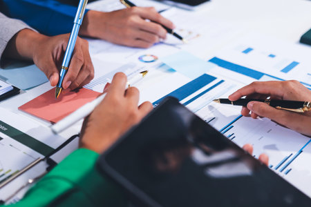 business people in meeting discussing plans together