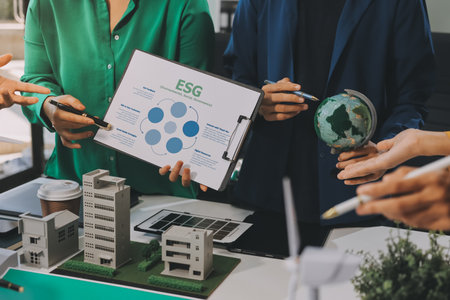 Young Asian business team discussion reusable product in office,start up eco-friendly business,environmental protection,sustainable business model,ESG strategy,team meeting,people work at home conceptの写真素材