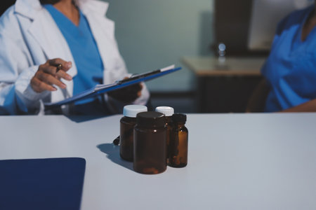 Closeup, doctor holding hands with senior woman and cancer care or support. Healthcare or trust, empathy or compassion and female caregiver or nurse holding elderly person hand for hope and kindnessの写真素材