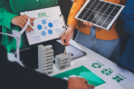 Young Asian business team discussion reusable product in office,start up eco-friendly business,environmental protection,sustainable business model,ESG strategy,team meeting,people work at home conceptの写真素材