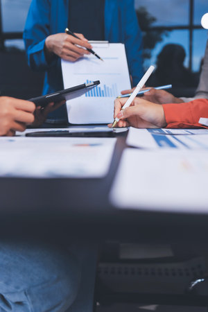 Business Team Analyzing Financial Data in Modern Office