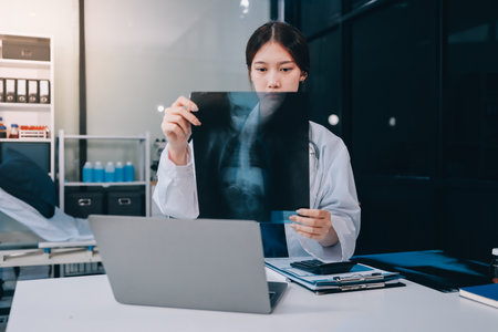 Medical health clinic doctor working using tablet touching, stethoscope diagnosing patient analysis...