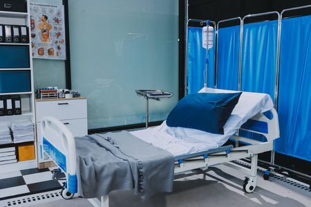 side view of empty hospital bed in clinic chamberの写真素材