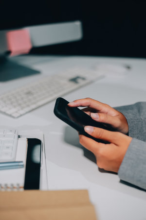 Portrait of Asian young female working on laptop at officeの写真素材