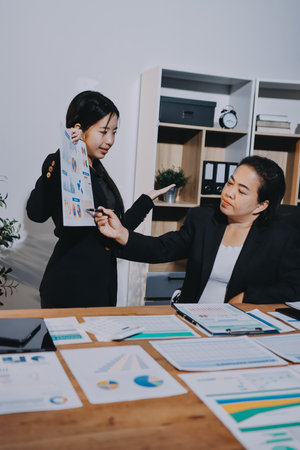 Business analyze,Close up Business people meeting to discuss the situation on the market. Business Financial Conceptの写真素材