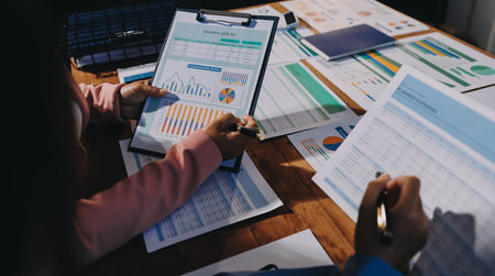 Business analyze,Close up Business people meeting to discuss the situation on the market. Business Financial Conceptの写真素材