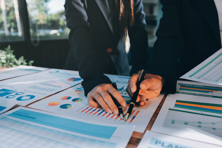 Business analyze,Close up Business people meeting to discuss the situation on the market. Business Financial Conceptの写真素材