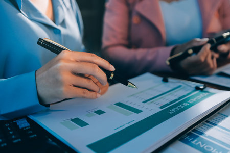 Business analyze,Close up Business people meeting to discuss the situation on the market. Business Financial Conceptの写真素材