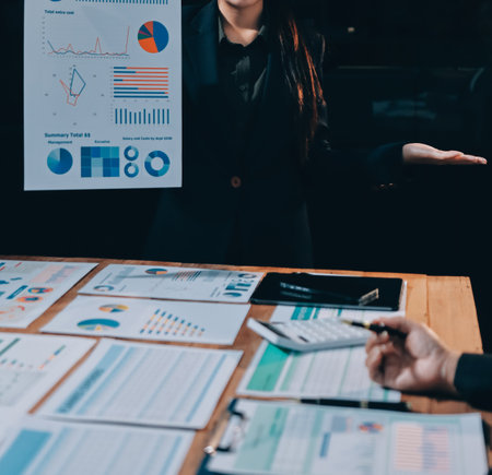 Business analyze,Close up Business people meeting to discuss the situation on the market. Business Financial Conceptの写真素材