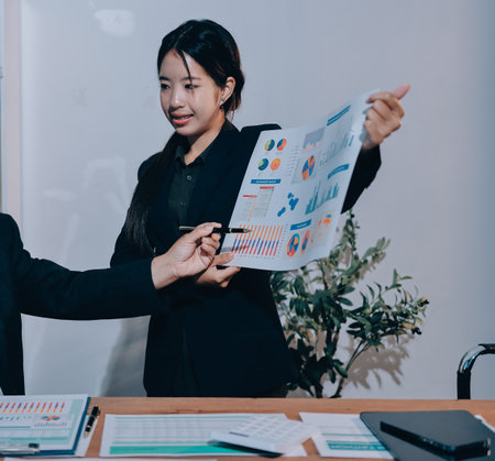 Business analyze,Close up Business people meeting to discuss the situation on the market. Business Financial Conceptの写真素材
