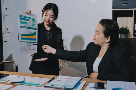 Business analyze,Close up Business people meeting to discuss the situation on the market. Business Financial Conceptの写真素材