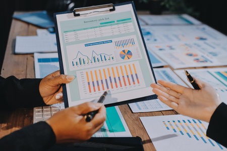 Business analyze,Close up Business people meeting to discuss the situation on the market. Business Financial Conceptの写真素材
