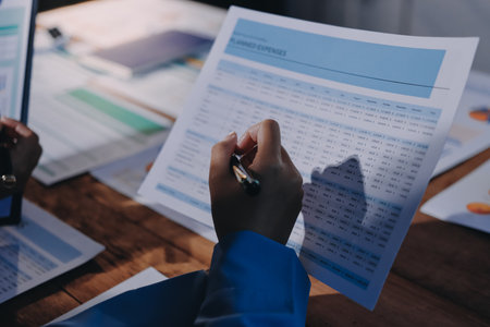 Business analyze,Close up Business people meeting to discuss the situation on the market. Business Financial Conceptの写真素材