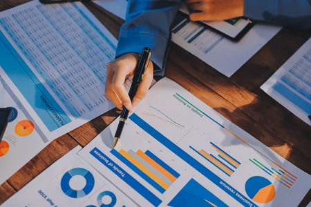 Business analyze,Close up Business people meeting to discuss the situation on the market. Business Financial Conceptの写真素材