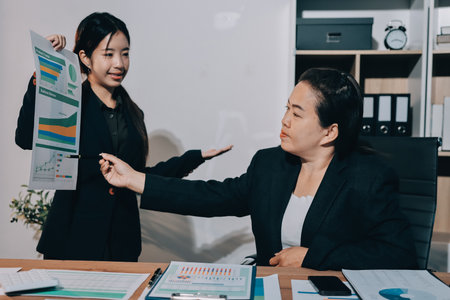 Business analyze,Close up Business people meeting to discuss the situation on the market. Business Financial Conceptの写真素材