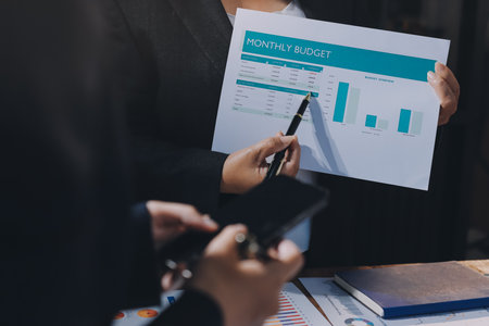 Business analyze,Close up Business people meeting to discuss the situation on the market. Business Financial Conceptの写真素材