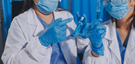 Researcher using a professional microscope