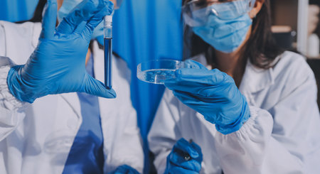 Researcher using a professional microscope