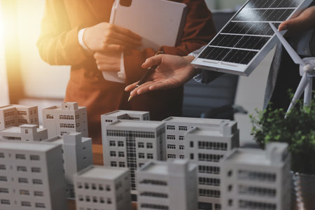 Discussion among businesspeople on the latest developments in solar cell panel technology and Solar...