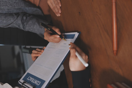 Lawyers having team meeting at law firm background. Concepts of Law and Legal services.の写真素材