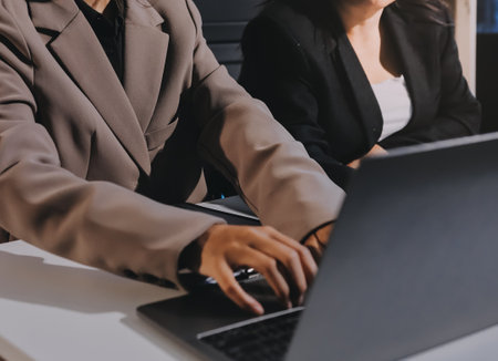 Concept of legal counseling. The lawyer or legal counsel is listening and providing advice to business people.の写真素材