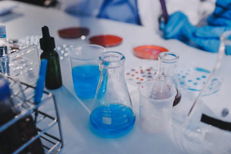 Researcher using a professional microscopeの写真素材