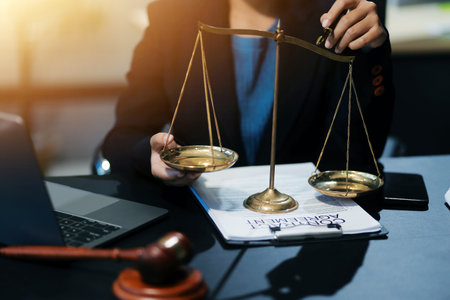 female business woman lawyers working at the law firms. Judge gavel with scales of justice. Legal law, lawyer, documents, advice and justice concept.の写真素材