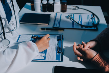 Specialized doctor is explaining taking medicine to a patient. Health and medicine consultation.