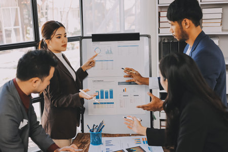 Accounting company provide finance and taxation planning for profitable cash flow, Auditor and accountant team working in office, analyze financial data and accounting record with calculator.Insightの写真素材